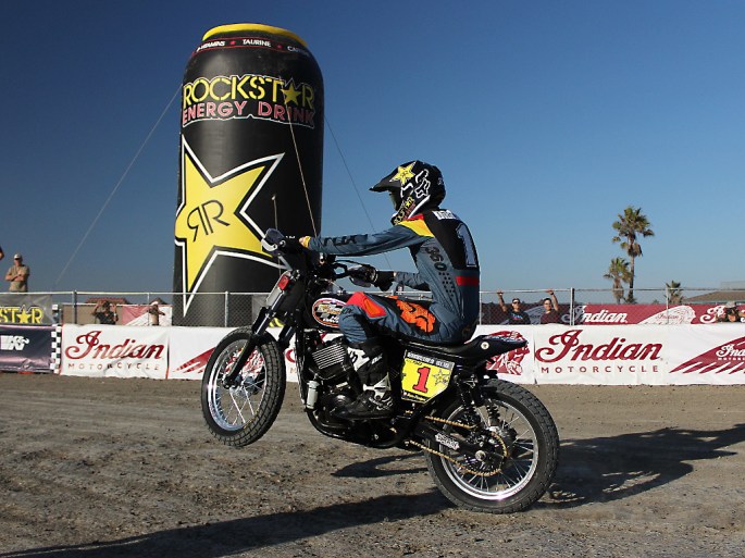 Harley motorcycle hooligan racer doing a wheelie