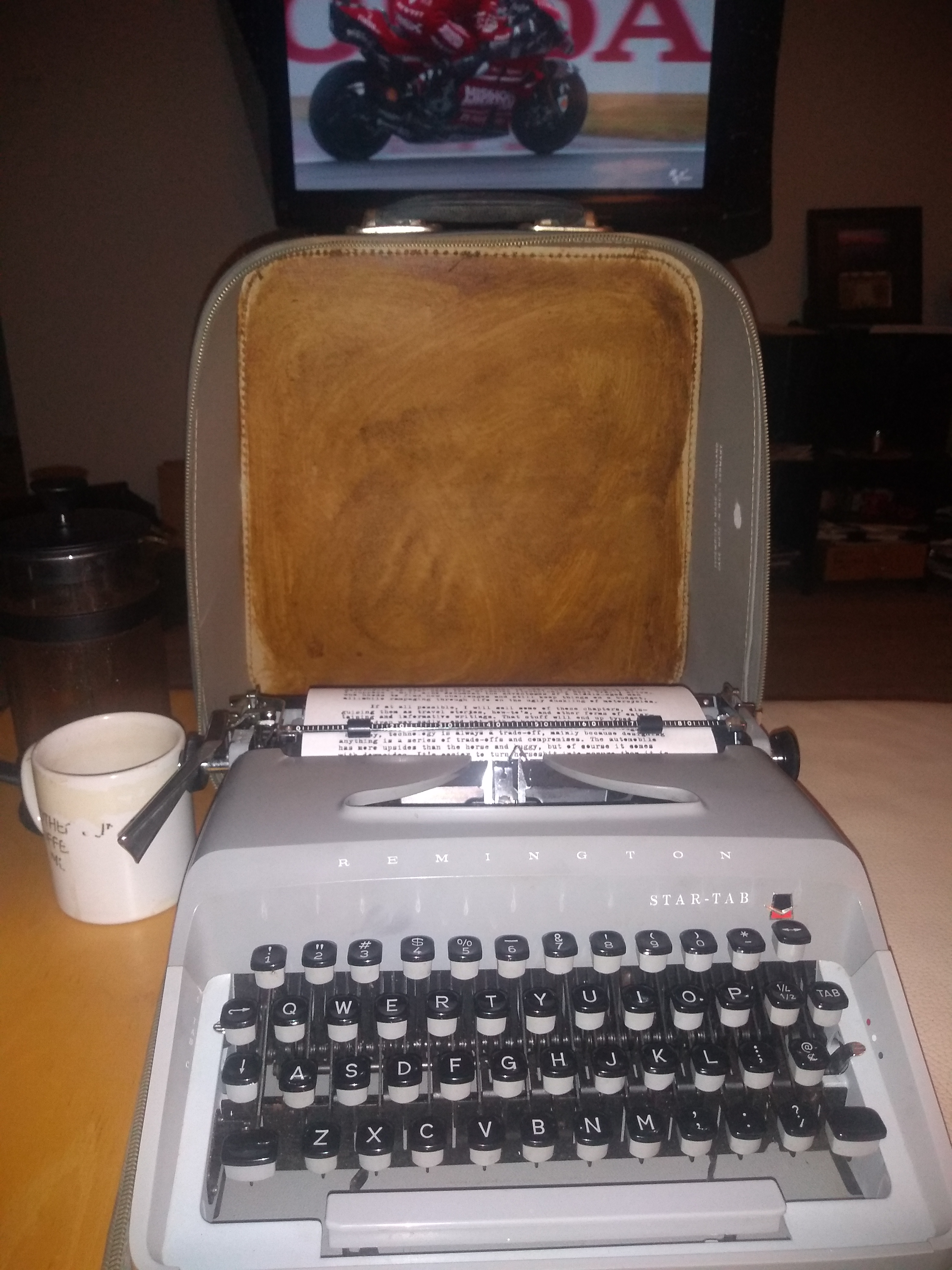 a portable remington typewriter on a table