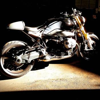 motorcycle stage lit with black backgound