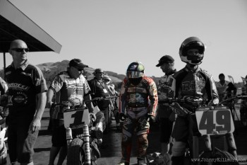 motorcycle racers pensive waiting at start line flat track racing