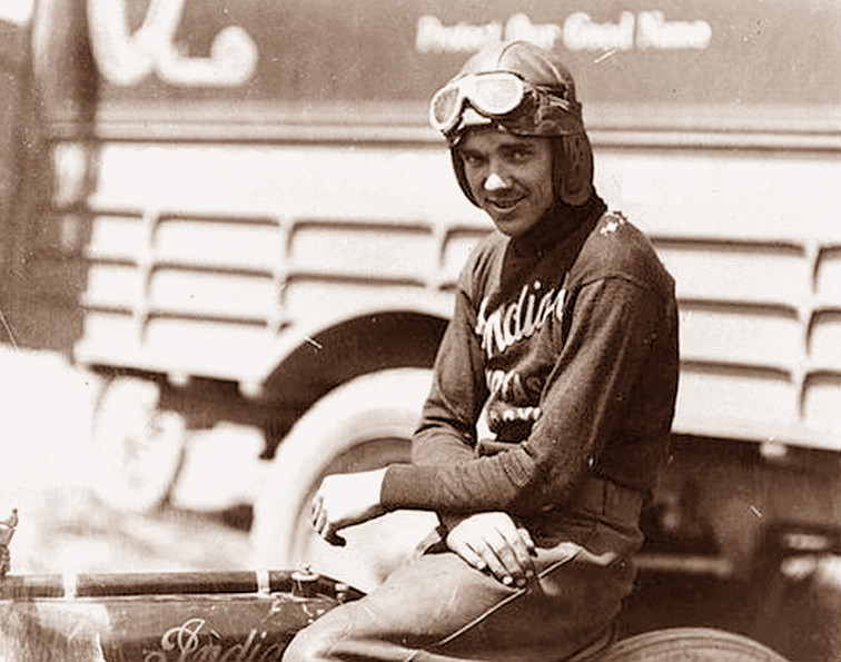 black and white photo of Albert Shrimp Burns aside an Indian boardtrack racing motorcycle