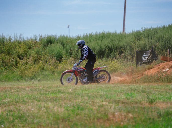 dirt bike landing hard from a jump