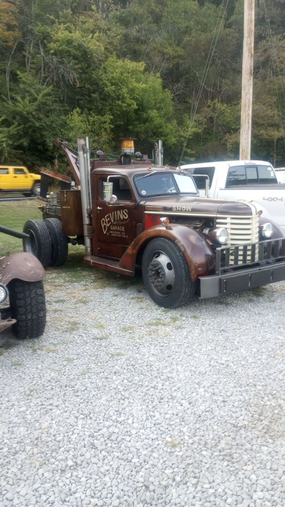 A 1940's or 50's era large farm truck converted into a rat rod.