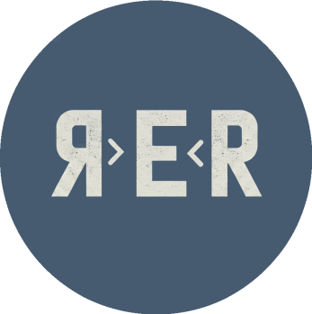 Blue round logo with RER in the center: the logo for Ride Eat Repeat